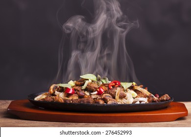 steaming chicken sizzler with noodles 
