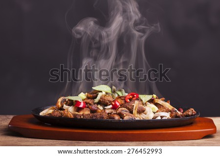 steaming chicken sizzler with noodles 