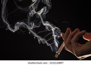  Steaming Cigarette In Male Hand. Smoking Habit. Tobacco Smoke