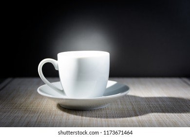 steaming cup on table