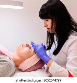 Steaming The Face To Open Pores, Applying Liquid Cream To Open Pores. New