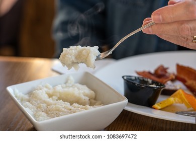 Steaming Hot Forkful Of Breakfast Grits