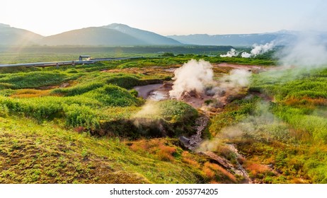 Steaming, sulfuric, active fumaroles near Pauzhetskaya Geothermal Power Plant, Kamchatka Peninsula, Russia