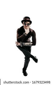 Steampunk Actor In Glasses And Hat Posing