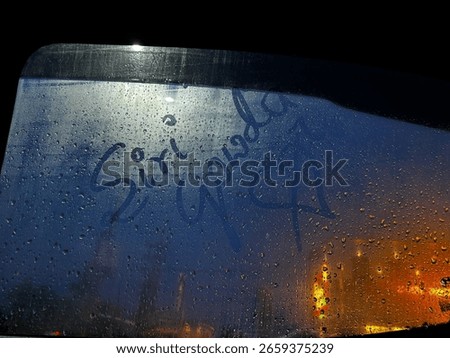 Steamy Window Message at Night