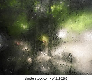 Steamy Window With Water Drop After Rainy Day In Monsoon Season