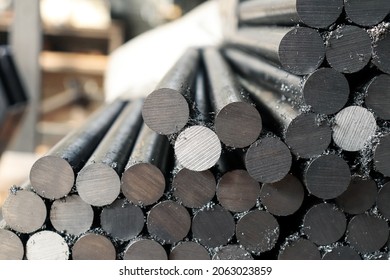 Steel bar cutting. Steel bar cut on a band saw for industrial use  - Shutterstock ID 2063023859