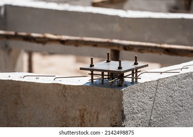 Steel base plate at fixed by j-bolt and steel bar in concrete,  Building and construction concept - Powered by Shutterstock