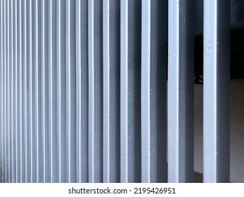 A Steel Beams Building Exterior Ventilation Metal Iron Wall Slats Border Wall Prison Security Fence