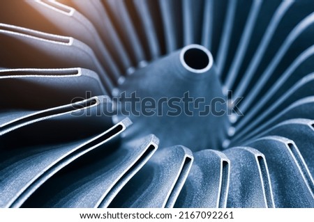 Steel blades of turbine propeller 3D printing. Close-up view. In BW. Selected focus on foreground