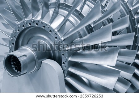 Steel blades of turbine propeller 3D printing. Close-up view. Selected focus on foreground, industrial additive technologies concept
