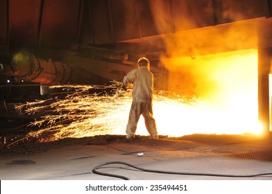 Steel blast furnace taphole spewed molten iron - Powered by Shutterstock