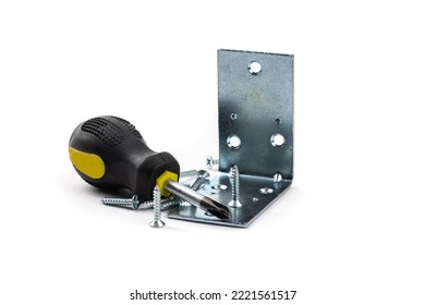 A Steel Bracket To Attach A Shelf With Screws And Screwdriver