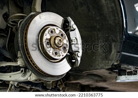 Steel brake disc with pad in car service