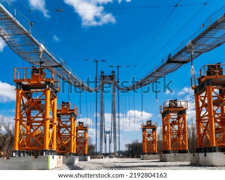 Steel bridge construction site with blue sky