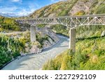 Steel bridge spanning gorge along the Nenana River in Denali, Alaska