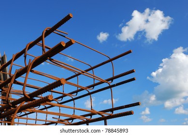 Steel building armature on blue sky background