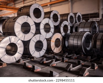 Steel coils are stacking at storage area in steel industry warehouse