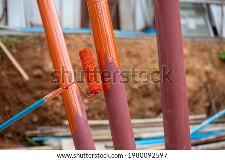 Steel columns, the steel roof structure is painted with beautiful orange color, which helps to prevent rust.