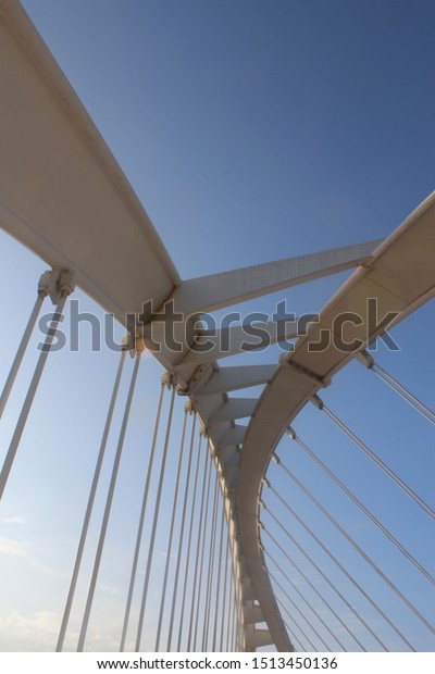 Steel connections\
and ropes from the bridge.\
