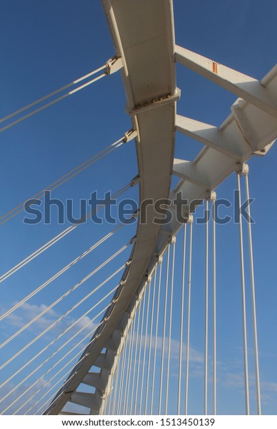 Steel connections\
and ropes from the bridge.\
