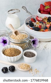 Steel Cut Oats Hot Cereal Served With Berries, Seeds, Walnuts And Milk Ready For Eating.