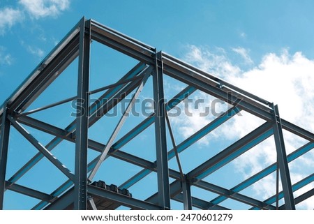 Image, Stock Photo Steel girders of the Wuppertal suspension railroad and row of houses with restored old buildings in rainy weather in Wuppertal in the Bergisches Land in North Rhine-Westphalia in neo-realistic black and white