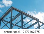 Steel Frame Construction Under Blue Sky