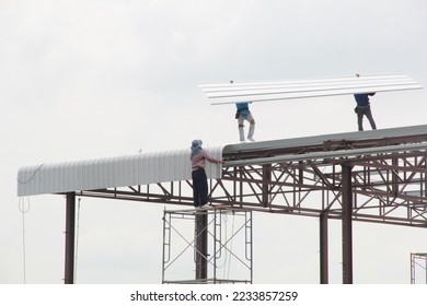 steel frame structure and equipments in construction site. cloudy sky background
 - Shutterstock ID 2233857259