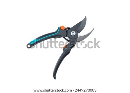 Steel gardening secateurs, scissors tool with blue and black grip for pruned of plants and flowers garden work, isolated on white background. Open state. Top view. Close-up.