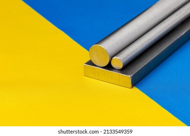 Steel and Iron on Ukraine flag. Ukrainian steel exports, trade and industry concept. - Shutterstock ID 2133549359