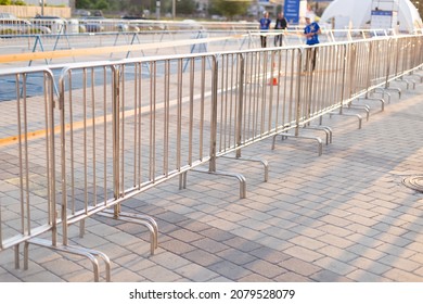 Steel mobile fence fence on the street. - Shutterstock ID 2079528079