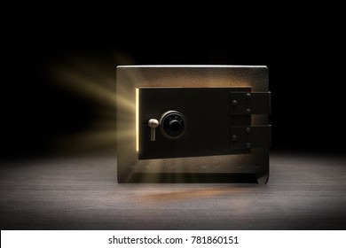 Steel money bank safe on a dark background / dramatic lit image