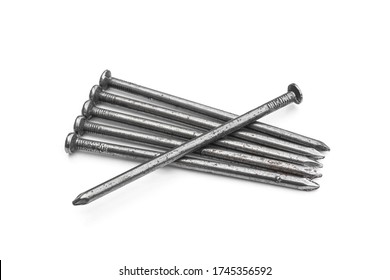 Steel nails 4-inch isolated on white background. - Shutterstock ID 1745356592