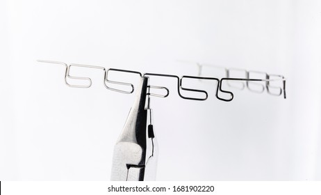 Steel Orthodontic Arch On A White Background