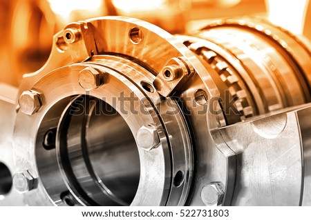 Steel parts for industrial machinery round shape. Selective toning. Close up.