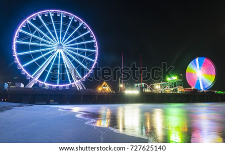 steel pier with reflection at night,Atlantic city,new jersey,usa.