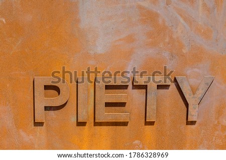 Steel Piety Street sign in Crescent Park, New Orleans, Louisiana, USA