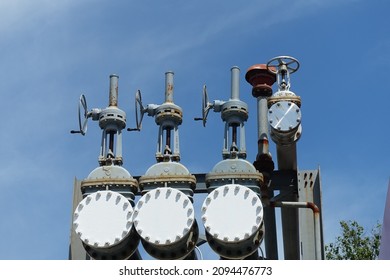 A Steel Pipe With A Blank Flange Shutting Off The End With Manual Valves For Future Expansion In Oil Station