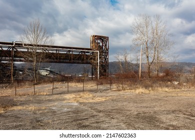 Steel Pipe Structure On Abandoned Steel Factory Grounds On Cloudy Day