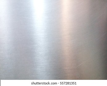 Steel plate metal background - Shutterstock ID 557281351