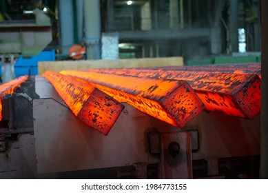Steel production in electric furnaces. Sparks of molten steel. Electric arc furnace shop . Metallurgical production, heavy industry, engineering, steelmaking - Shutterstock ID 1984773155