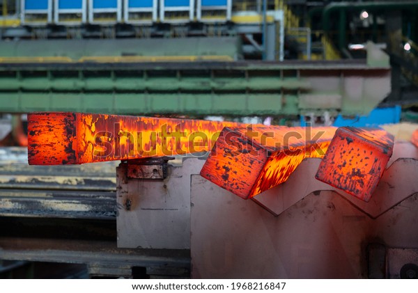 Steel production in electric\
furnaces. Sparks of molten steel. Electric arc furnace shop .\
Metallurgical production, heavy industry, engineering,\
steelmaking