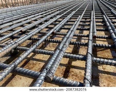 Steel rebar lap length in site construction for mat foundation. 