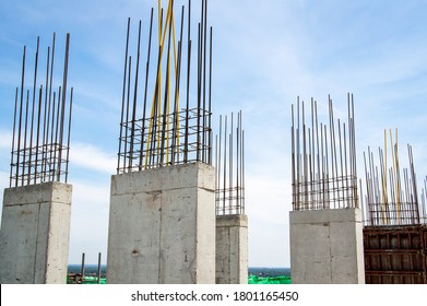 Steel reinforce in concrete column.Steel grid on the construction site.Reinforcement of concrete work. Using steel wire for securing steel bars with wire rod for reinforcement of concrete 