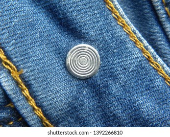 Steel Rivet On Blue Jeans