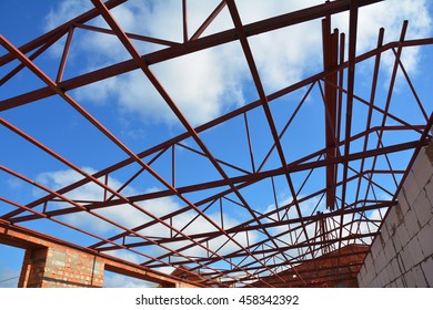 steel roof trusses details with clouds sky background steel roof trusses sitting on concrete pole - Metal Roof Trusses steel roof trusses details with clouds sky background steel roof trusses sitting on concrete pole - Metal Roof Trusses