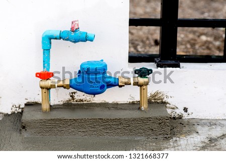 steel rust pipe,Tab water pipe and meter at outdoor.