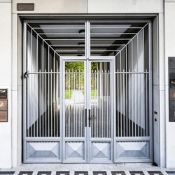 Steel Security Gate To Passage Into Courtyard