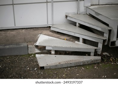 Steel staircase. Radial steps. Black entrance. Building details. - Powered by Shutterstock